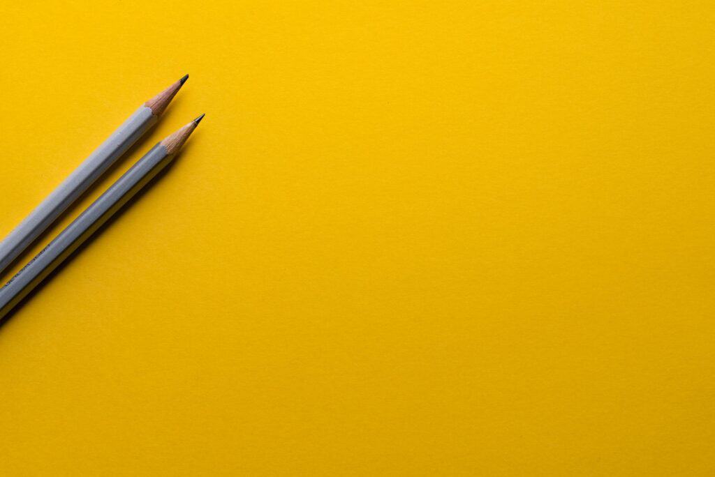 Pencils With Yellow Background For Writing
