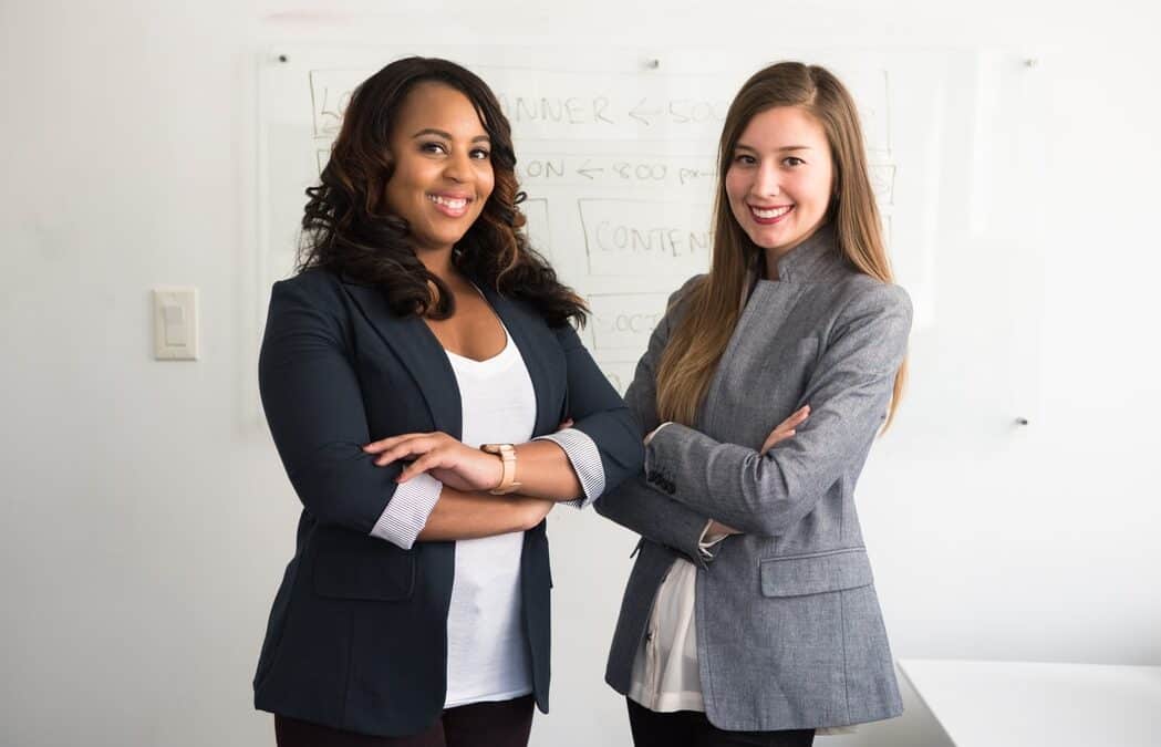 Recruiter And Headhunter Standing Next To Each Other